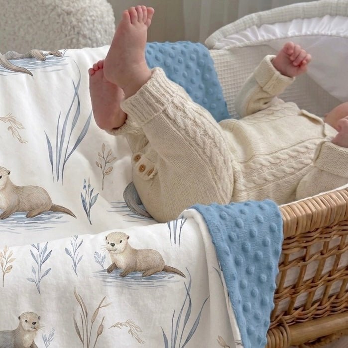 couverture loutres bébé